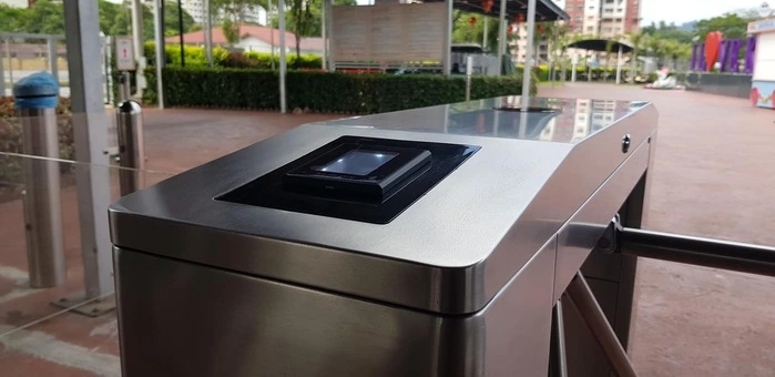QR code scanner turnstile gate at a residential property entrance for visitor access control by Gprop Systems.